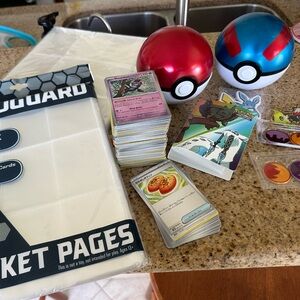 ❌SOLD❌Pokémon card lot, protector sheets, balls, magnets, and marker set